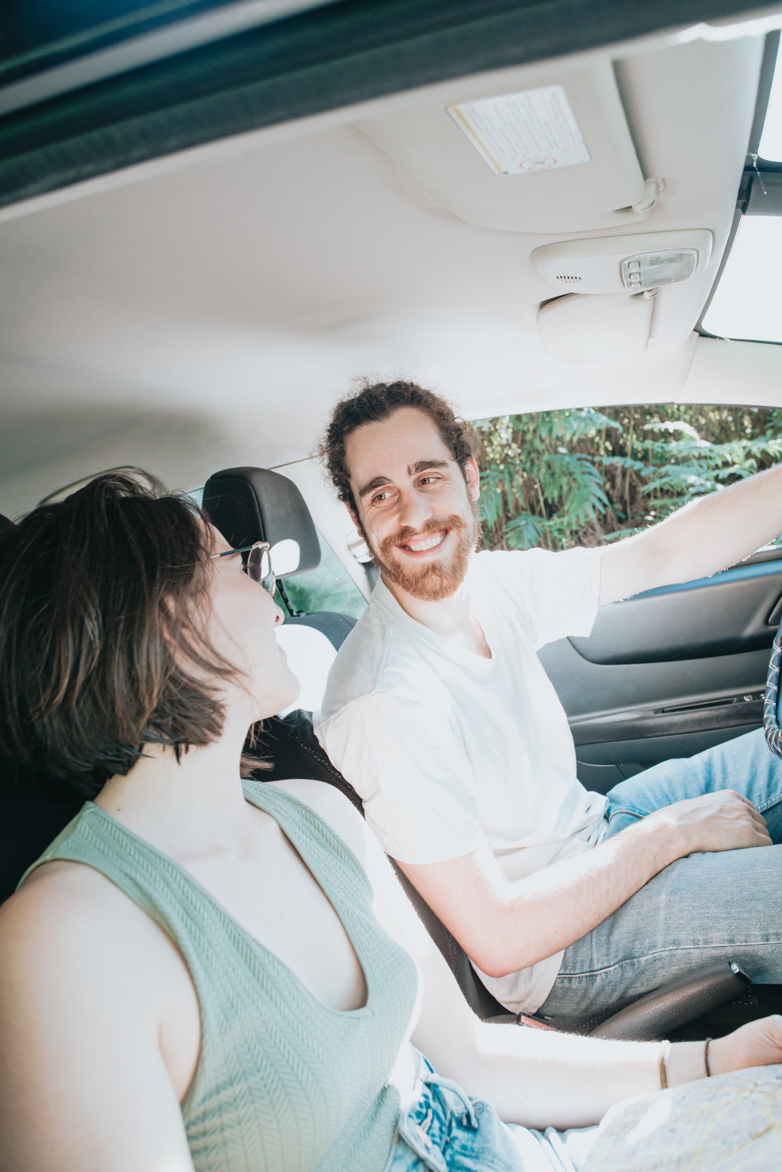 files/the-inside-of-a-vehicle-with-people-smiling-together.jpg